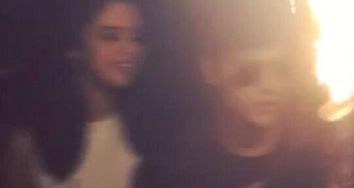 Justin Bieber and Selena Gomez at a party