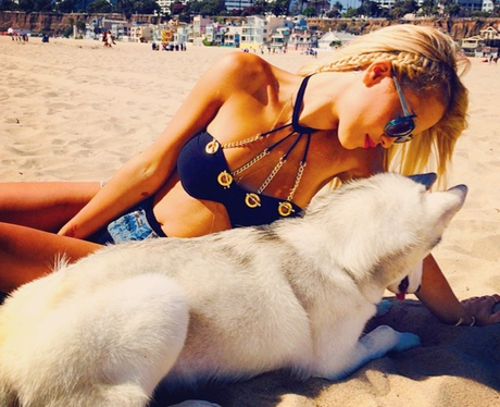 Rita Ora relaxes on the beach