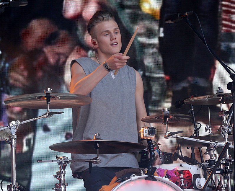 The Vamps Tristan drumming on stage at wembley