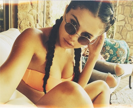 Selena Gomez wearing sunglasses