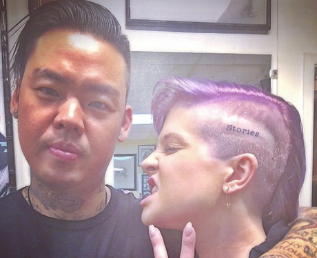 Kelly Osbourne showing off her new tattoo