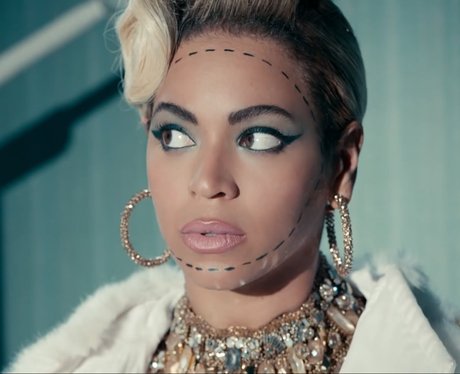 Beyonce with strange makeup in Pretty Hurts video.