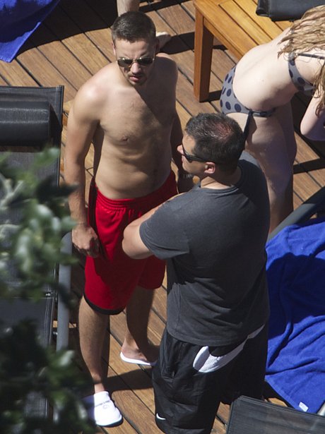 Liam Payne topless on holiday