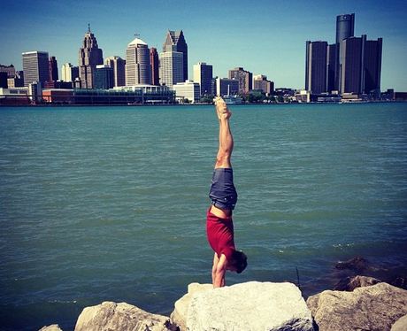 Tom Daley doing a hand stand