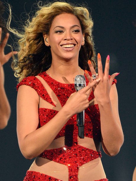 Beyonce in cut out outfit.