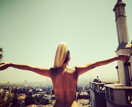 Rita Ora topless on Instagram