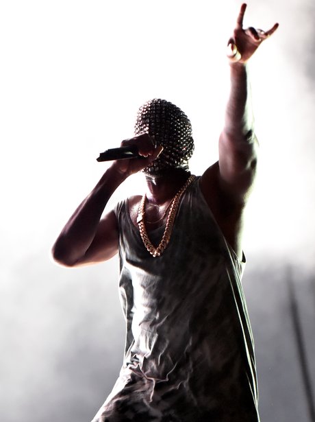 Kanye West wearing a diamond mask