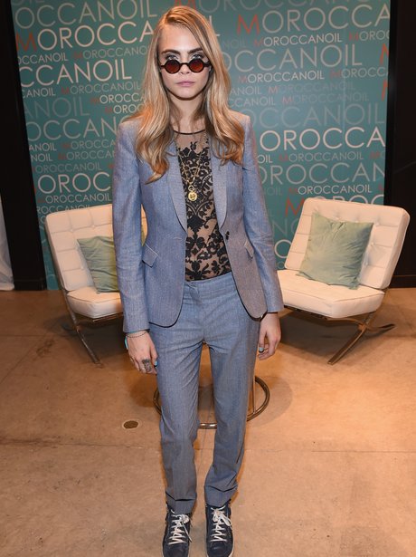 Cara Delevingne wearing a suit