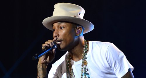 Pharrell performing on stage 