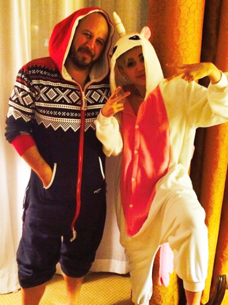 Miley Cyrus wearing a onesie