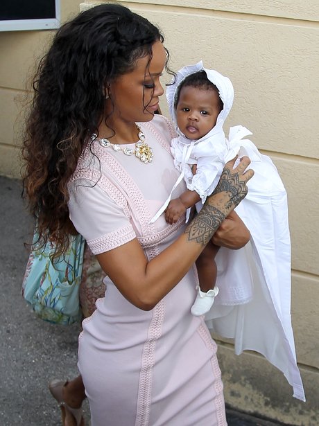 Rihanna at family members christening