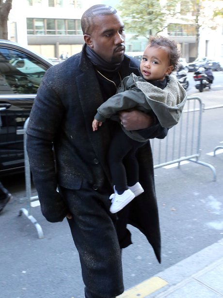 Kanye West and baby North in London 