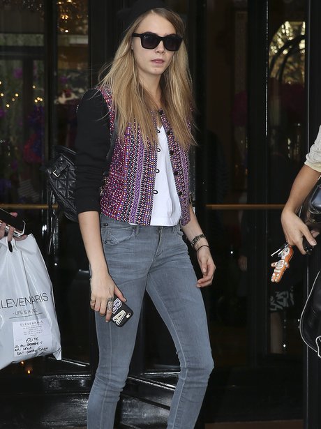 Cara Delvingne wearing glasses