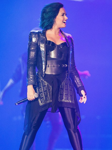 Demi's feeling BLUE! The 'Really Don't Care' star performs with her new ...