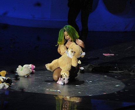 Lady Gaga performs with a teddy on stage
