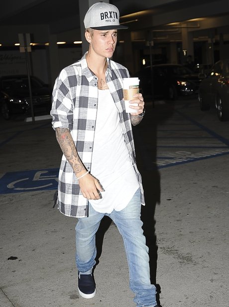 Justin Bieber having a coffee