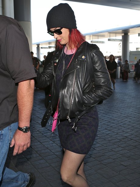 Katy Perry with pink hair at the airport