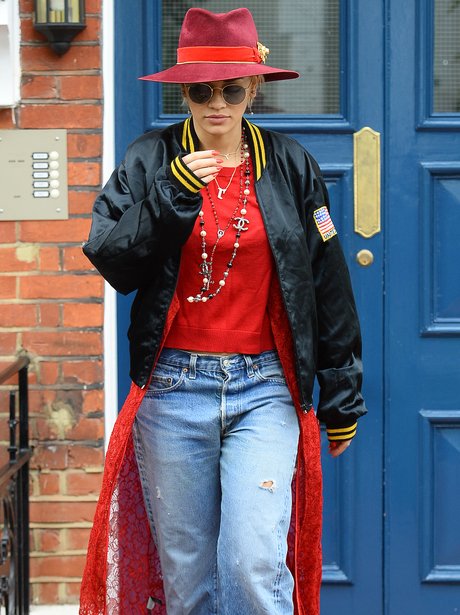 Rita Ora wearign a red hat
