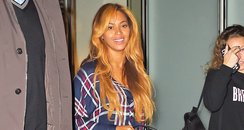 Beyonce wears check shirt and leather skirt