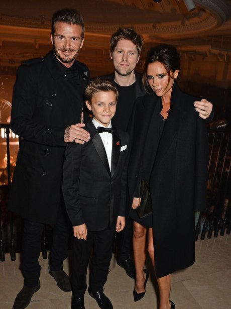 David, Victoria and Romeo Beckham Burberry launch