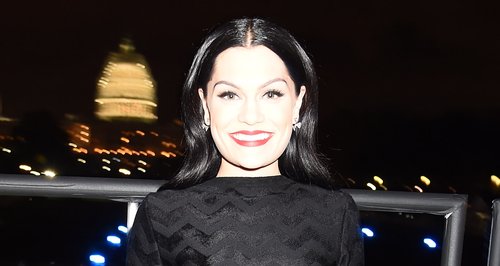 Jessie J wearing a black catsuit 