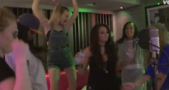 Little Mix and Jess Glynne in the studio behind th
