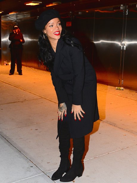 Rihanna wearing a black outfit