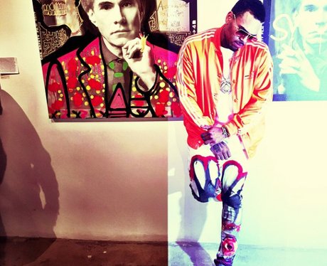Chris Brown with painted jeans