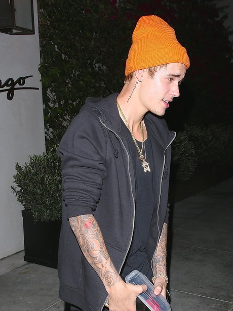 Justin Bieber is never one to shy away from LOUD clothes - nice hat