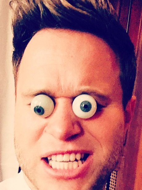 Olly Murs plays with googly eyes