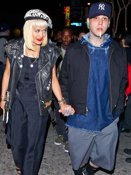 Rita Ora and Ricky Hillfiger holding hands