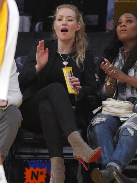 Iggy Azalea watching the basketball