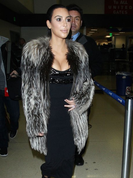 Kim Kardashian wearing a fur coat