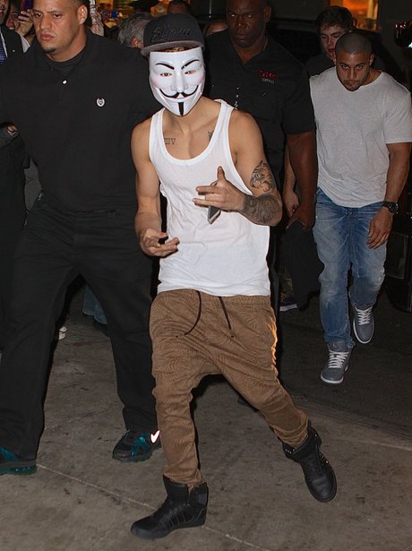 Justin Bieber wearing a mask 