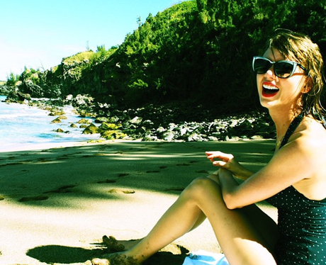 Taylor Swiftw earing a bathing suit on holiday