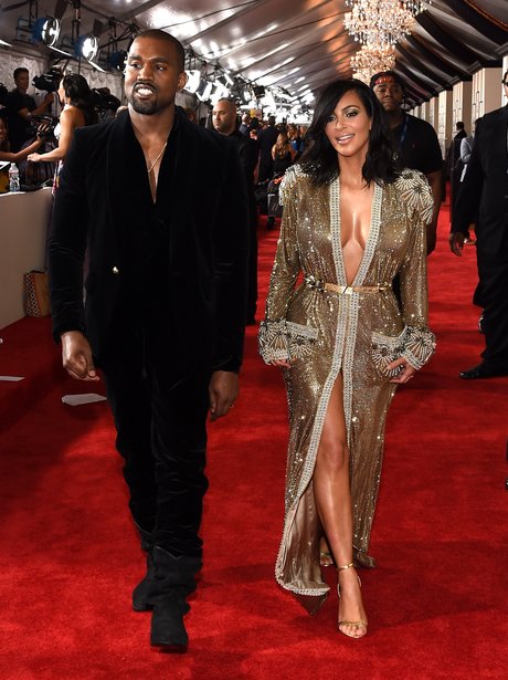 Kanye West and Kim Kasdashian arrive at the Grammy