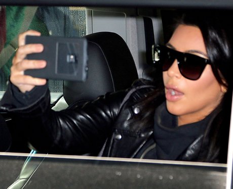 Kim Kardashian taking a selfie