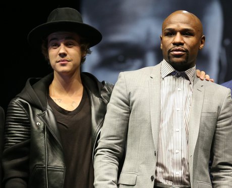 Justin Bieber appears on stage with Floyd Maywea