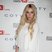 Image 1: Kesha wearing a White Dress