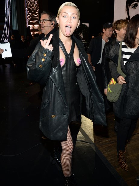 Miley Cyrus wearing a cut out dress