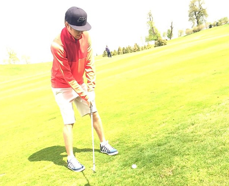 Niall Horan playing golf