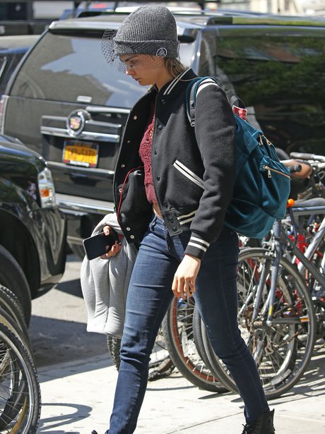 Cara Delevingne wearing a beanie
