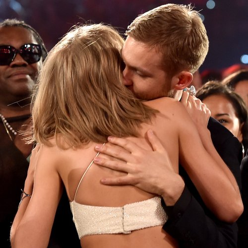 Calvin Harris and Taylor Swift hugging