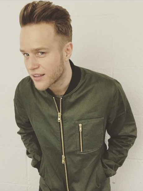Olly Murs wearing a bomber jacket 