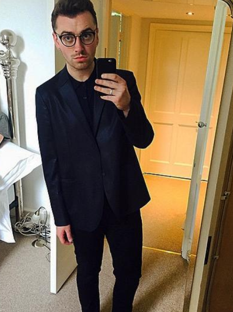 Sam Smith wearing a suit