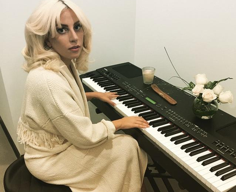 Lady Gaga playing the keyboard