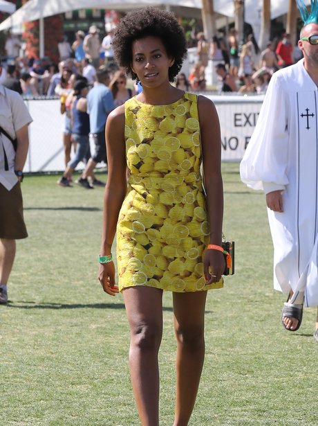 solange wearing a lemon dress at coachella