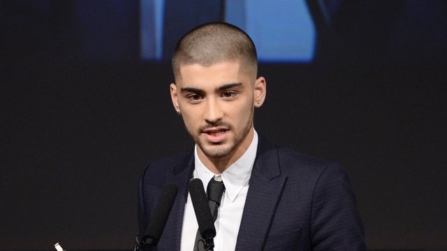 Zayn Malik with a shaved head 