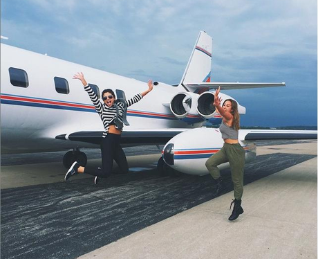 Selena Gomz jumping outside her private jet