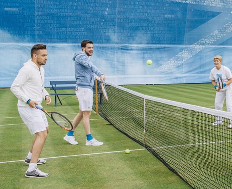 Liam Payne playing tennis